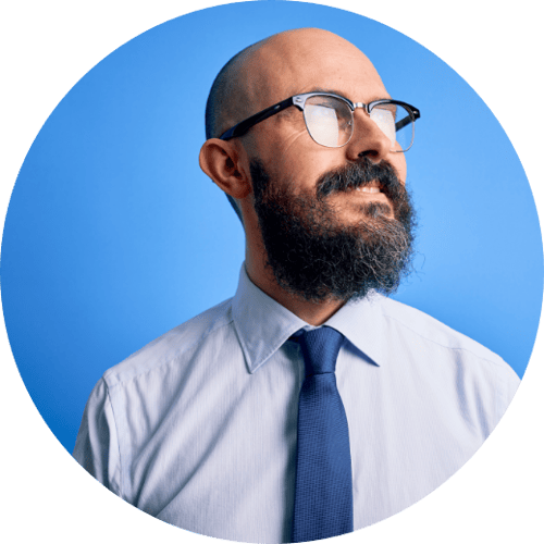 Male with Glasses and Tie Blue Background